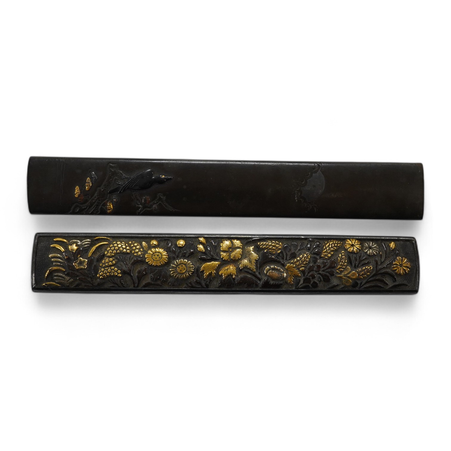 Two 19th century Japanese bronze and mixed metal kozuka knife handles, largest 9.5cm. Condition - good